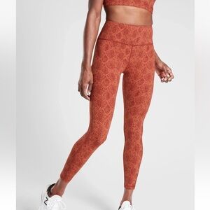 Athleta Ultimate Stash Pocket Snake 7/8 Tight Orange Brown Stretch Medium